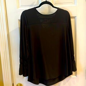 Chico’s Size 2, 12/14, Black Long Sleeve Top with tie closure in the back.
